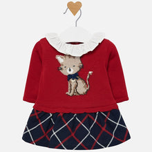 Load image into Gallery viewer, Mayoral Singapore Dress. Cute dress for baby girls by Mayoral Newborn, made in a red knitted cotton blend. It has a sweet kitten in the weave, wearing a bow and silver logo charm, with a lined navy blue skirt below, checked in red and white.