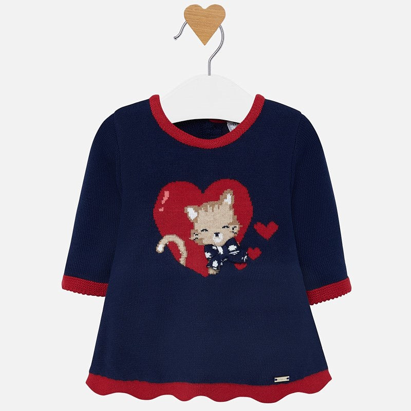 Mayoral Singapore Knit Dress for Baby Girls. Your little one will love wearing this sweet and soft knit dress from Mayoral. Crafted from a fine cotton blend knit, it includes a cat print. Pair with tights and booties for a sweet daytime look.