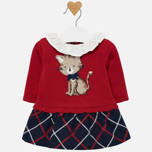 Load image into Gallery viewer, Mayoral Singapore Dress. Cute dress for baby girls by Mayoral Newborn, made in a red knitted cotton blend. It has a sweet kitten in the weave, wearing a bow and silver logo charm, with a lined navy blue skirt below, checked in red and white.
