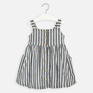 Mayoral Singapore Striped Dress. Girls striped dress from Mayoral. Made in a soft, lightweight cotton and linen blend, it has button fastening down the front, with pockets on the sides. It is fully lined in soft polycotton for added comfort.